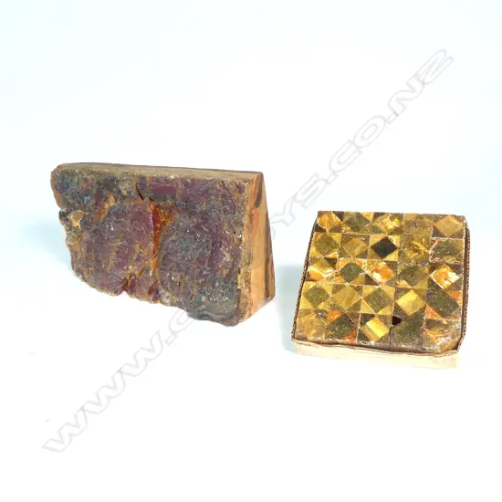 A kauri gum tile assembled out of cut and geometric pieces of gum