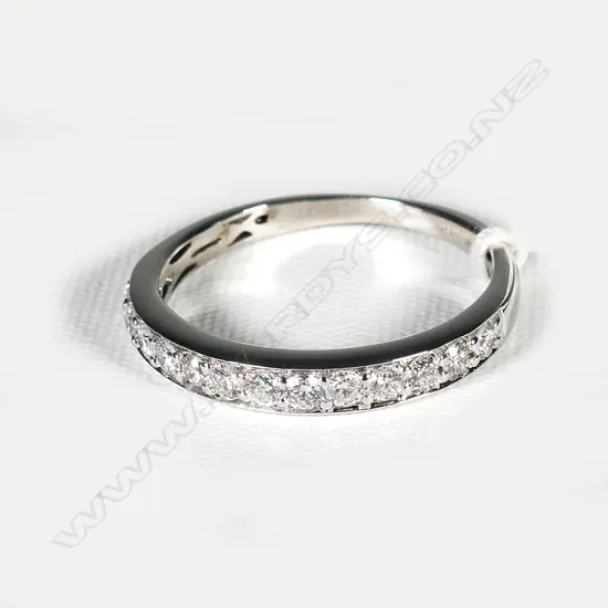 18CT WHITE GOLD AND DIAMOND BAND (VAL)