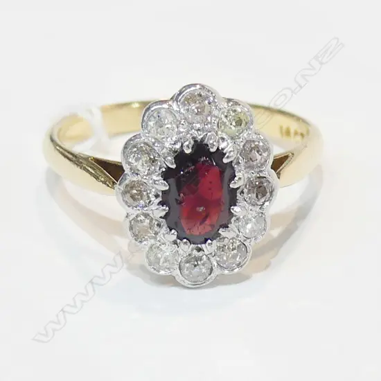 18CT PLATINIUM DIAMOND GARNET RING. EVALUATION RP 2,700  