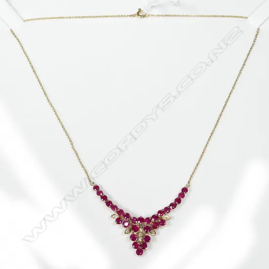 14CT GOLD DIAMOND AND RUBY NECKLACE WITH VALUATION PAPERS