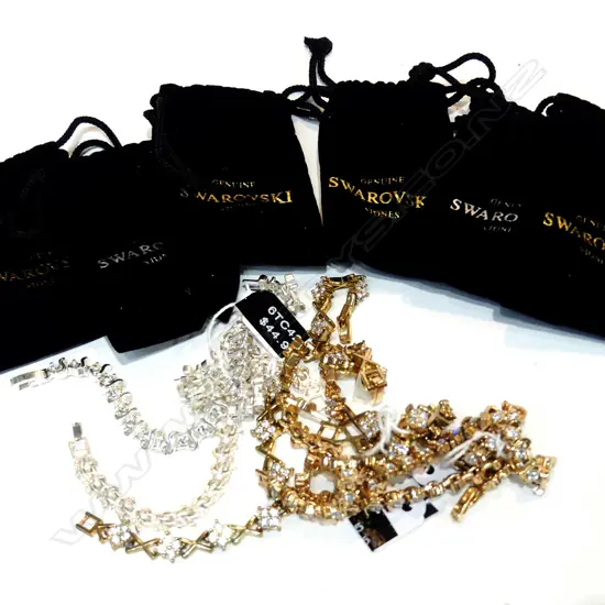 6X SWAROVSKI BRACELETS IN BLACK BAGS