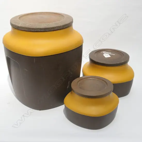 SET OF THREE 1970S WOOD & PLASTIC KITCHEN CONTAINERS, IN YELLOW/BROWN. TALLEST. 330MM