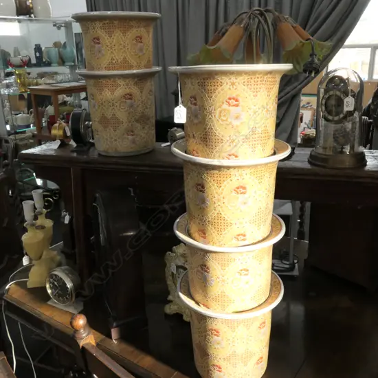 6 YELLOW FLORAL PLANT POTS. H. 260MM