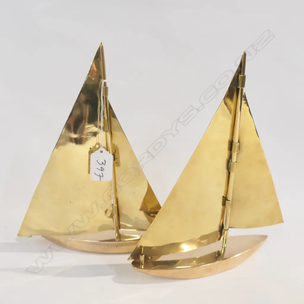 PAIR OF BRASS YACHTS Image 1++