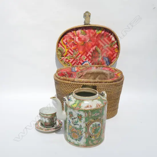 CHINESE TEAPOT IN WHICKER BASKET