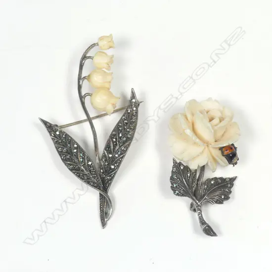 TWO IVORY/SILVER/MARCASITE BROOCHES