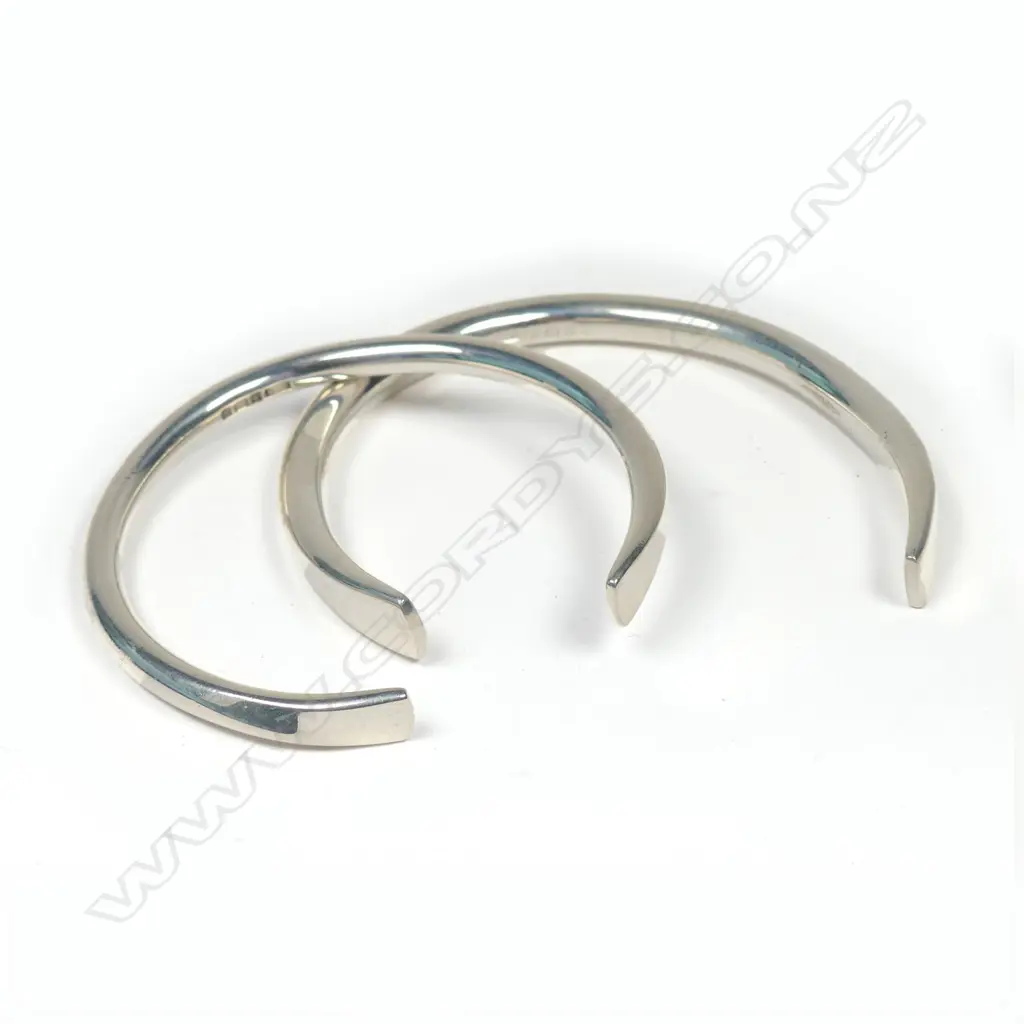 TWO SILVER BANGLES Image 1++