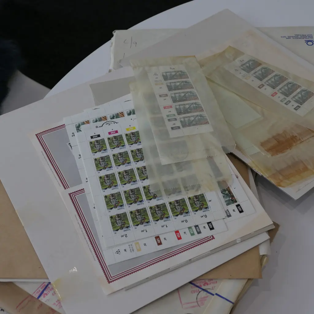 FOUR FOLIOS OF SOUTH AFRICAN STAMPS Image 1++