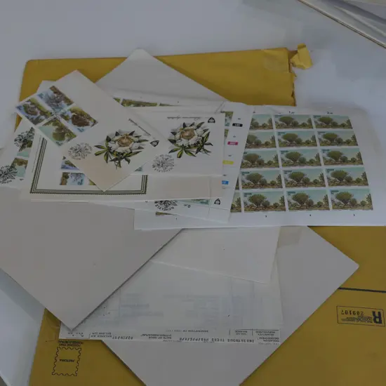 FOUR FOLIOS OF SOUTH AFRICAN STAMPS