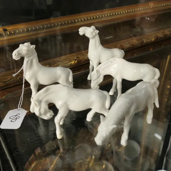5 WHITE PORCELAIN HORSES
