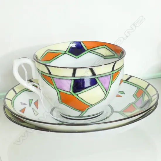 STANDARD CHINA ART DECO CUP AND 2 SAUCERS