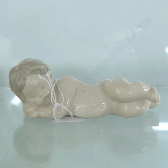 SMALL LLADRO RECLINING CHILD W. 90MM