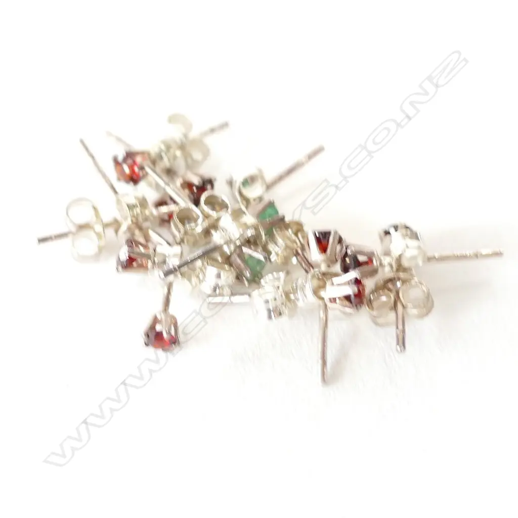 SILVER EMERALD AND GARNET STUDS 7prs Image 1++