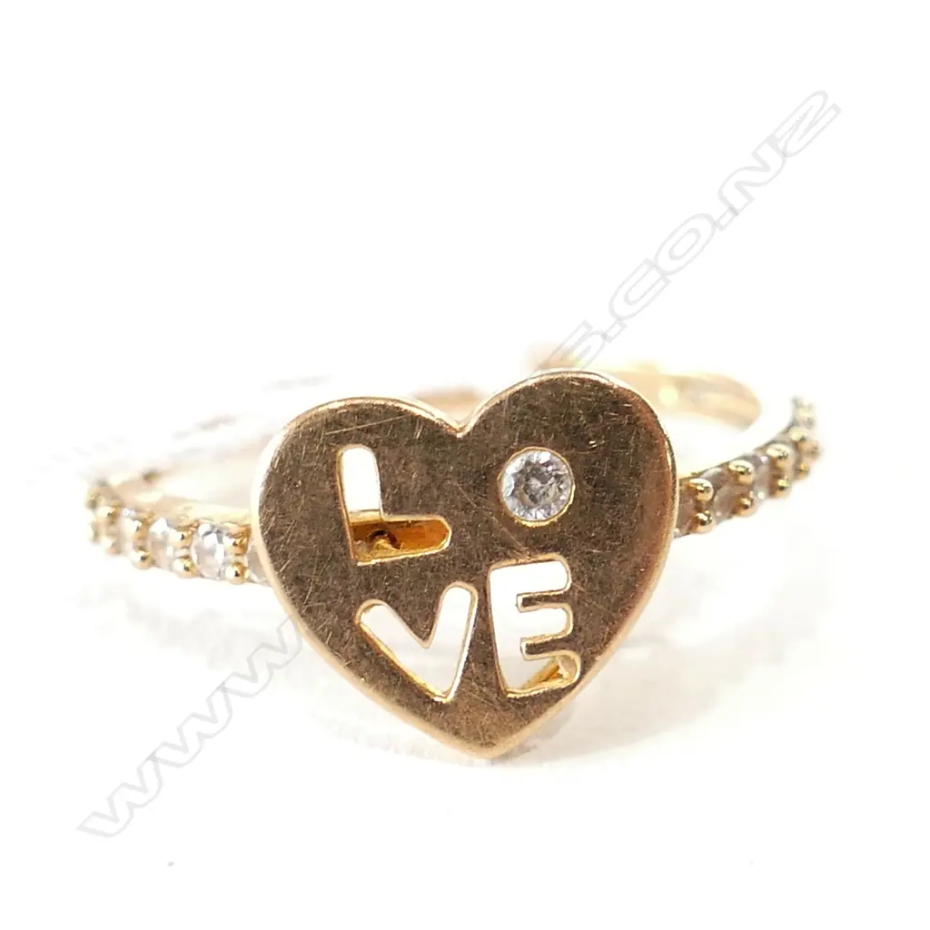 18K (700) 'LOVE' RING W DIAMOND1.92GMS Image 1++