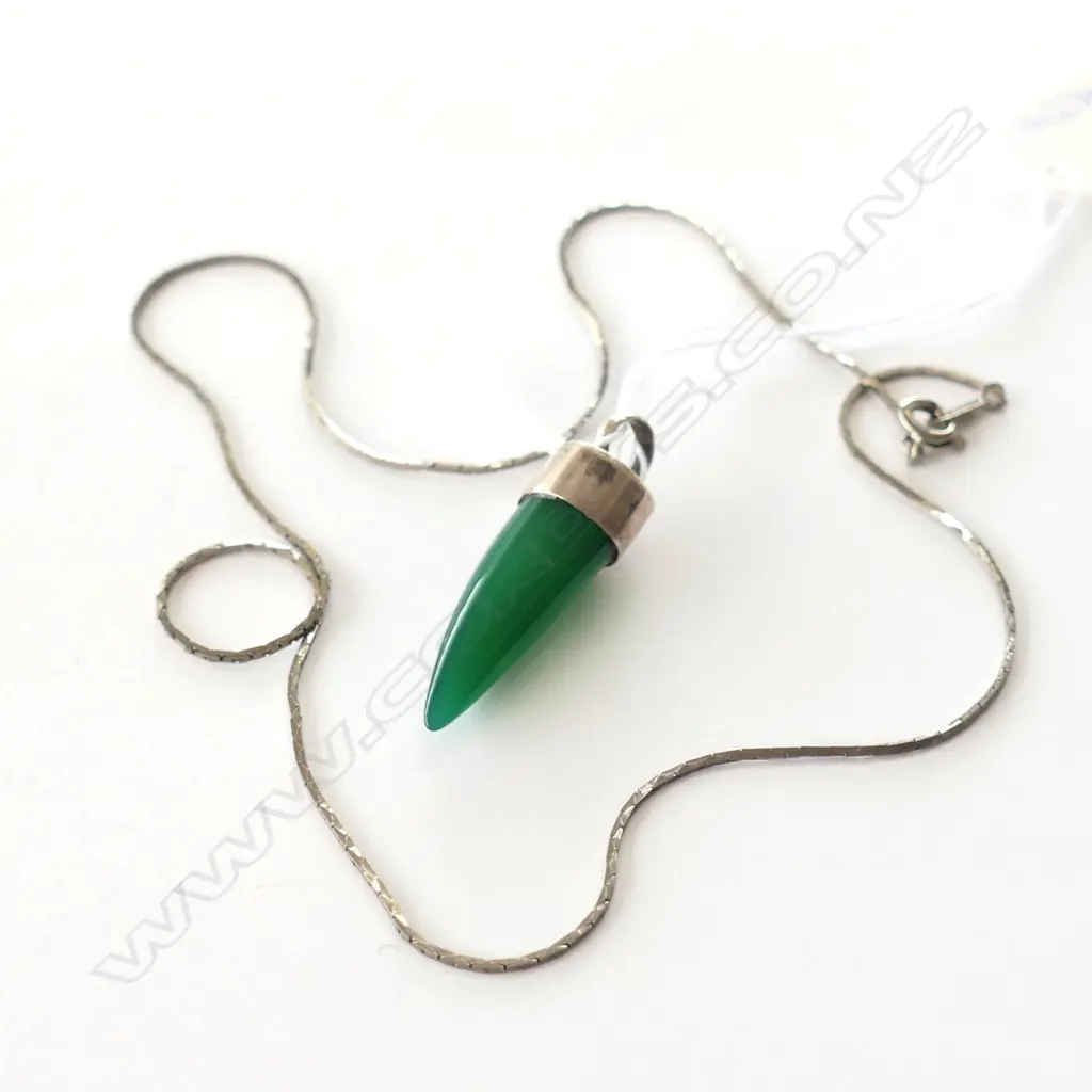 GREEN GEMSTONE TOOTH AND SILVER PENDANT Image 1++