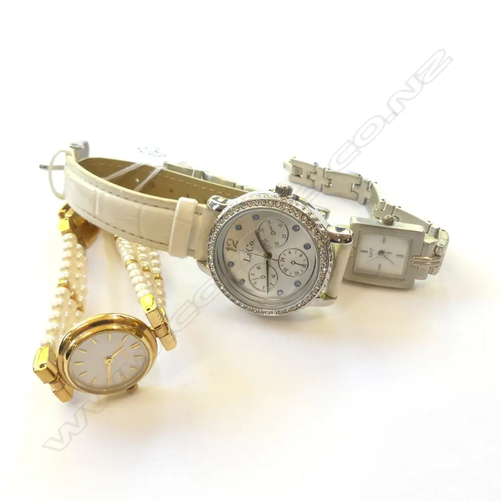 THREE LADIES WRIST WATCHES Image 1++