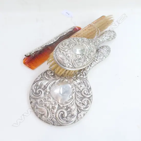 4 piece silver dressing table set. Hand mirror