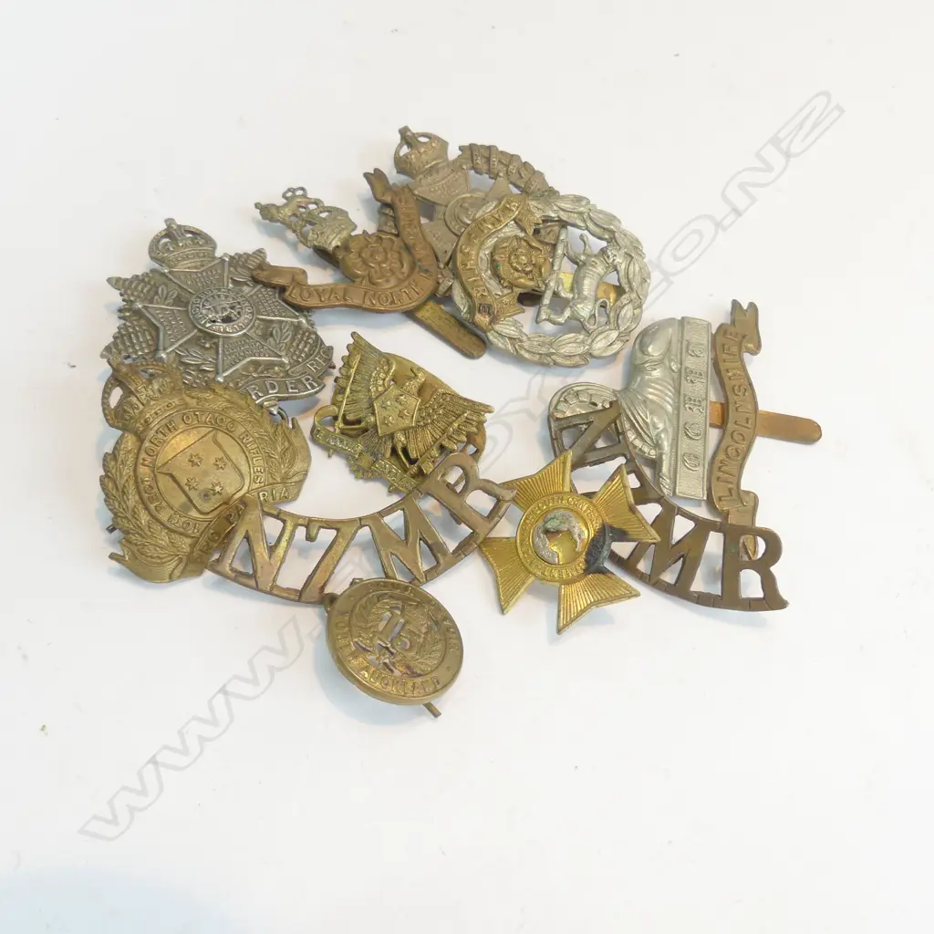 2 BAGS MILITARY BADGES APPROX 10 Image 1++