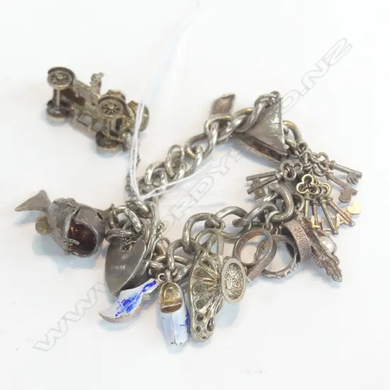 SILVER CHARM BRACELET AND CHARMS 55gm