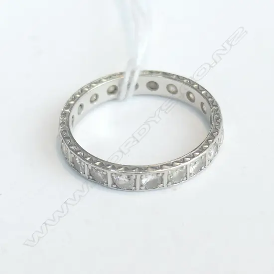 UNMARKED PLATINUM OR GOLD DIAMOND ETERNITY RING