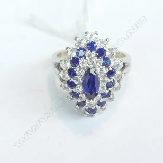 9CT WHITE GOLD FAUX SAPPHIRE RING 7.7gms