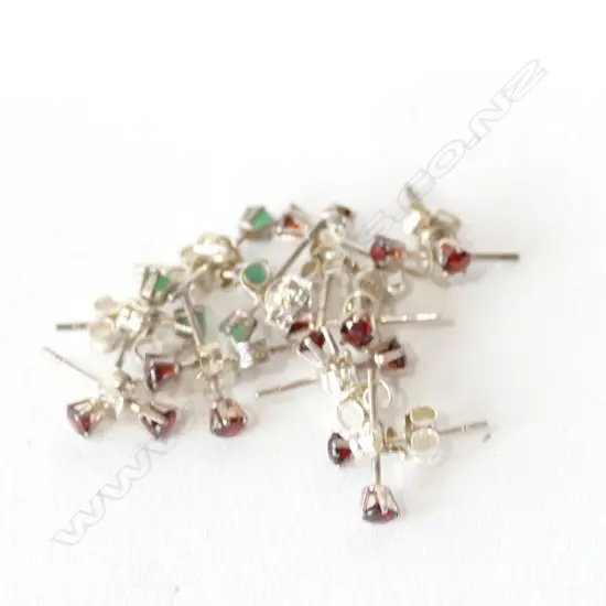 SILVER EMERALD AND GARNET STUDS 10 prs