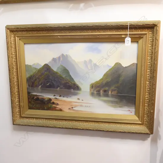 COLONIAL OIL ON BOARD, MILFORD SOUND, INITIALLED O'K., DATED '09, 345 x 550mm
