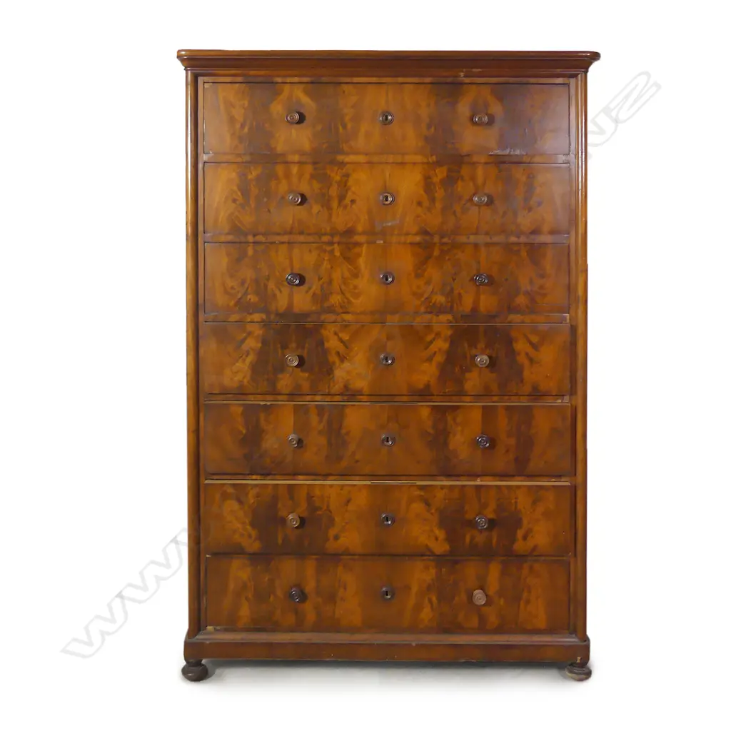 A Victorian flame mahogany seven drawer tallboy Image 1++