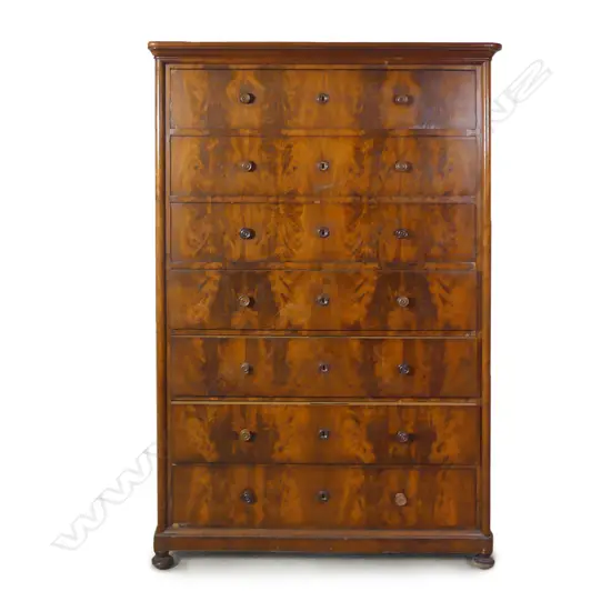 A Victorian flame mahogany seven drawer tallboy