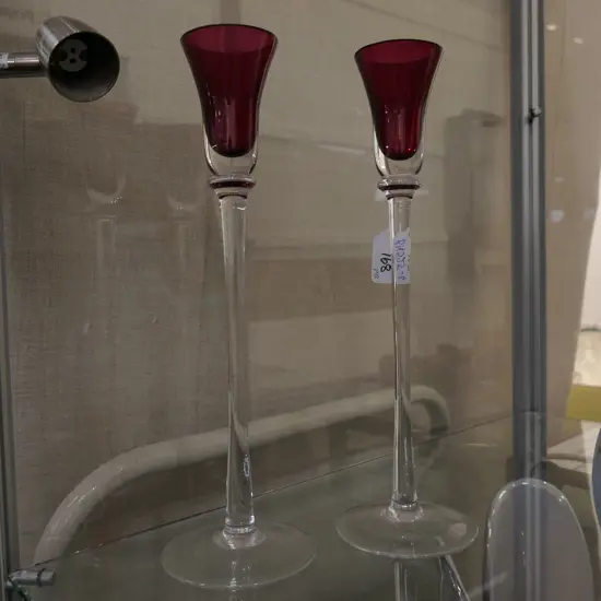 PAIR OF TALL CRANBERRY GLASS CANDLESTICKS