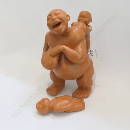 ORIENTAL COMICAL FIGURE MOTHER & FEEDING CHILD...