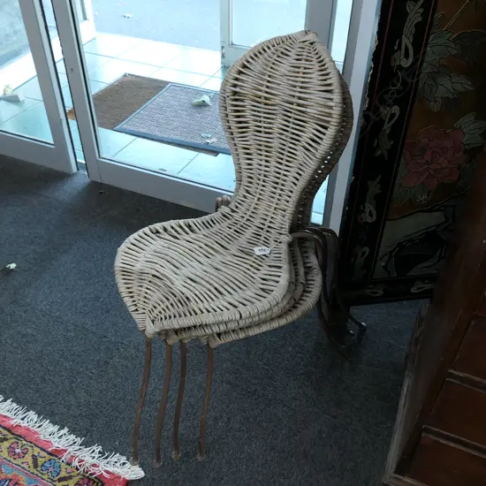 FOUR 3 LEGGED IRON AND WICKER SIDE CHAIRS