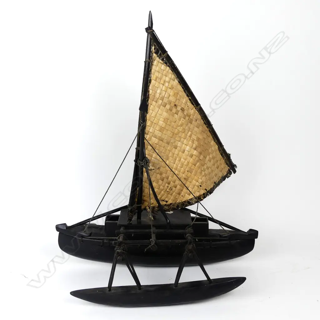 A Hawaiian model outrigger canoe Image 1++