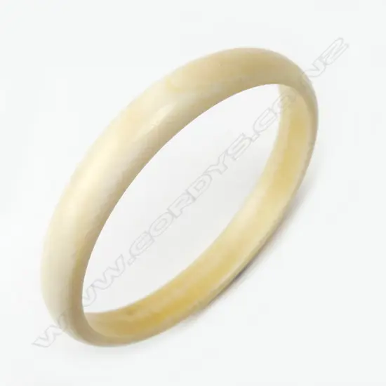 A vintage ivory bangle