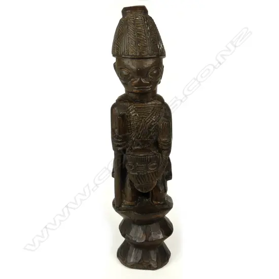 A West African carved wooden figure on horseback