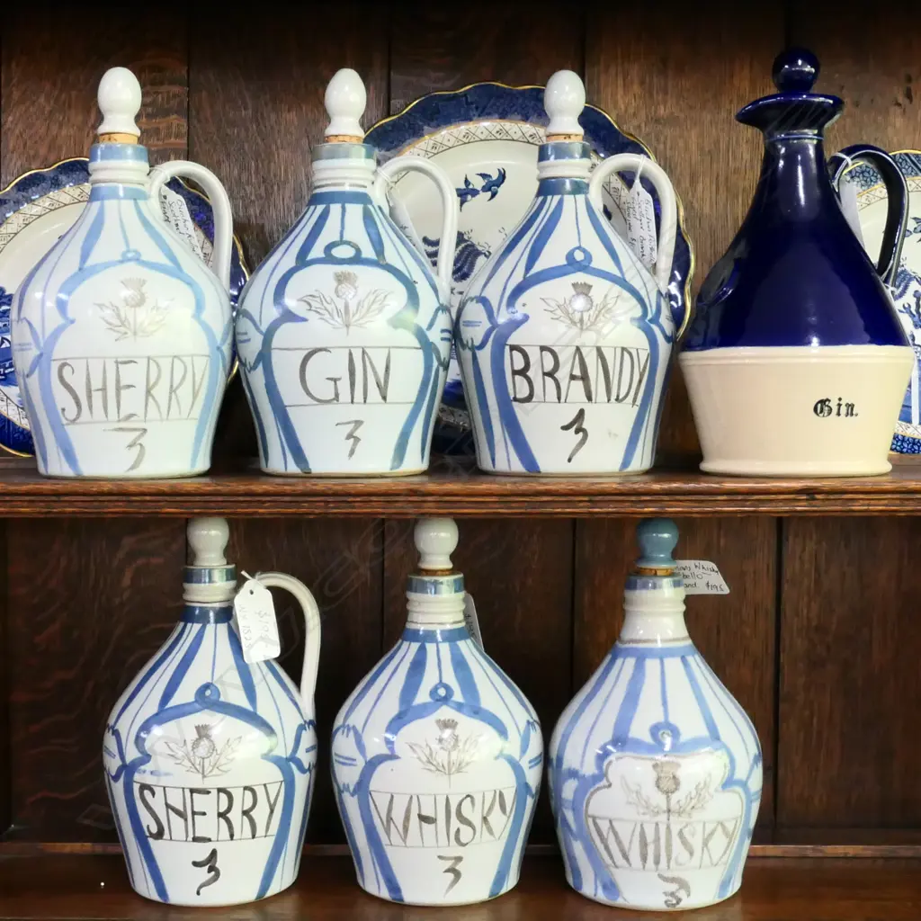 7 BUCHAN STONEWARE PORTOBELLO SCOTLAND FLASKS; 2X SHERRY, 2X WHISKY, BRANDY, GIN AND ONE OTHER (GIN)  Image 1++