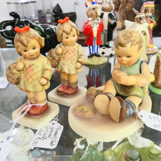 3 HUMMEL FIGURINES; 2X GIRL WITH BASKET, SEATED BOY