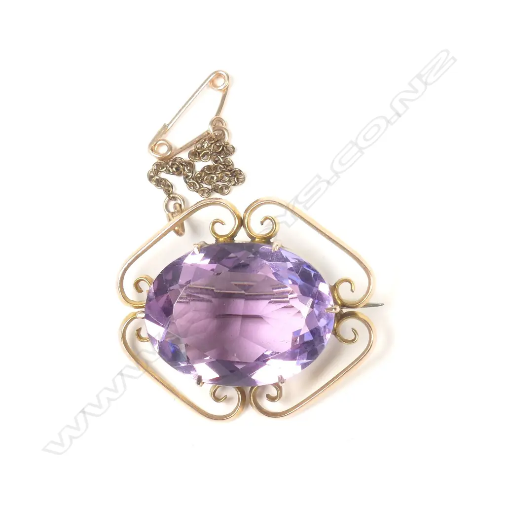 9CT GOLD AND AMETHYST BROOCH Image 1++