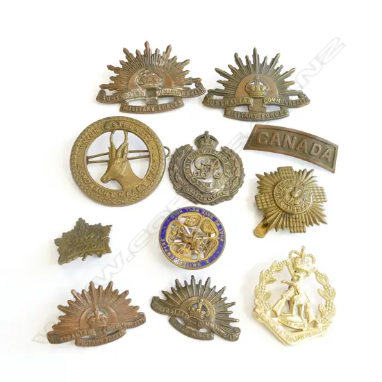 BAG 11 MILITARY BADGES ....