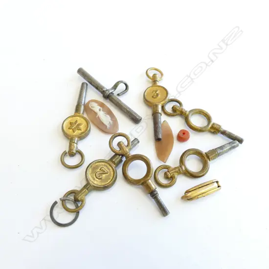 BAG OF WATCH KEYS; 2 LOOSE CAMEO PIECES