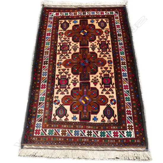 A hand knotted Balouch rug