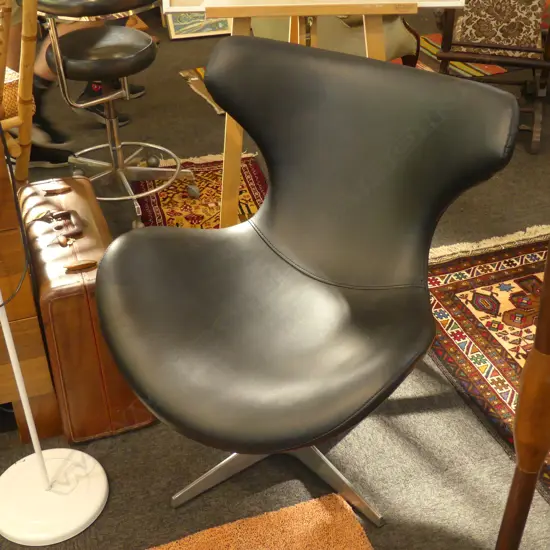 2 MODERNIST STYLE FAUX LEATHER CHAIRS