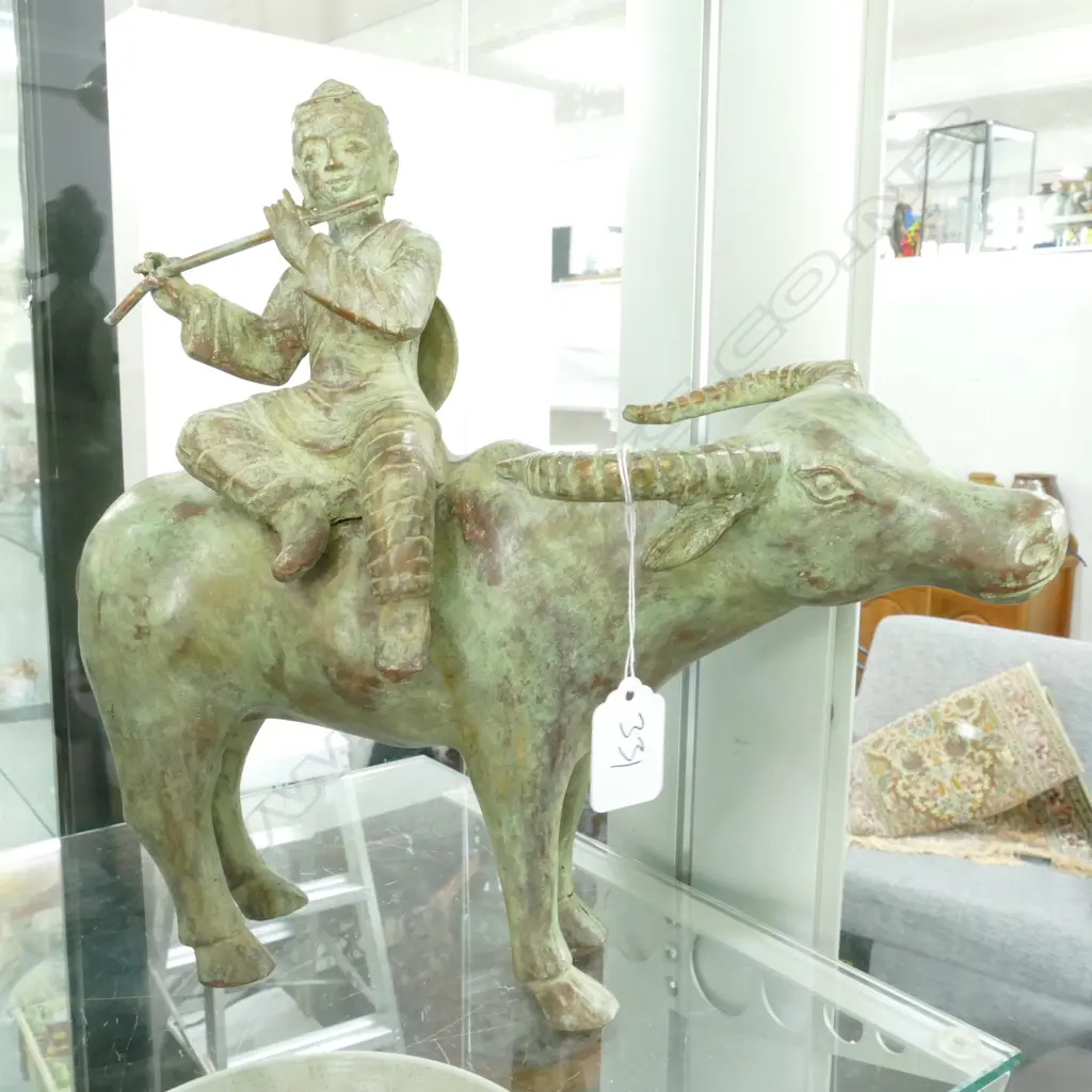 BRONZE BUFFALO WITH MAN PLAYING FLUTE 320MM L Image 1++