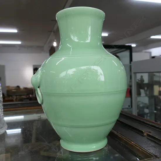 CHINESE PALE CELADON VASE WITH SEAL MARK UNDER THE BASE. H.300mm