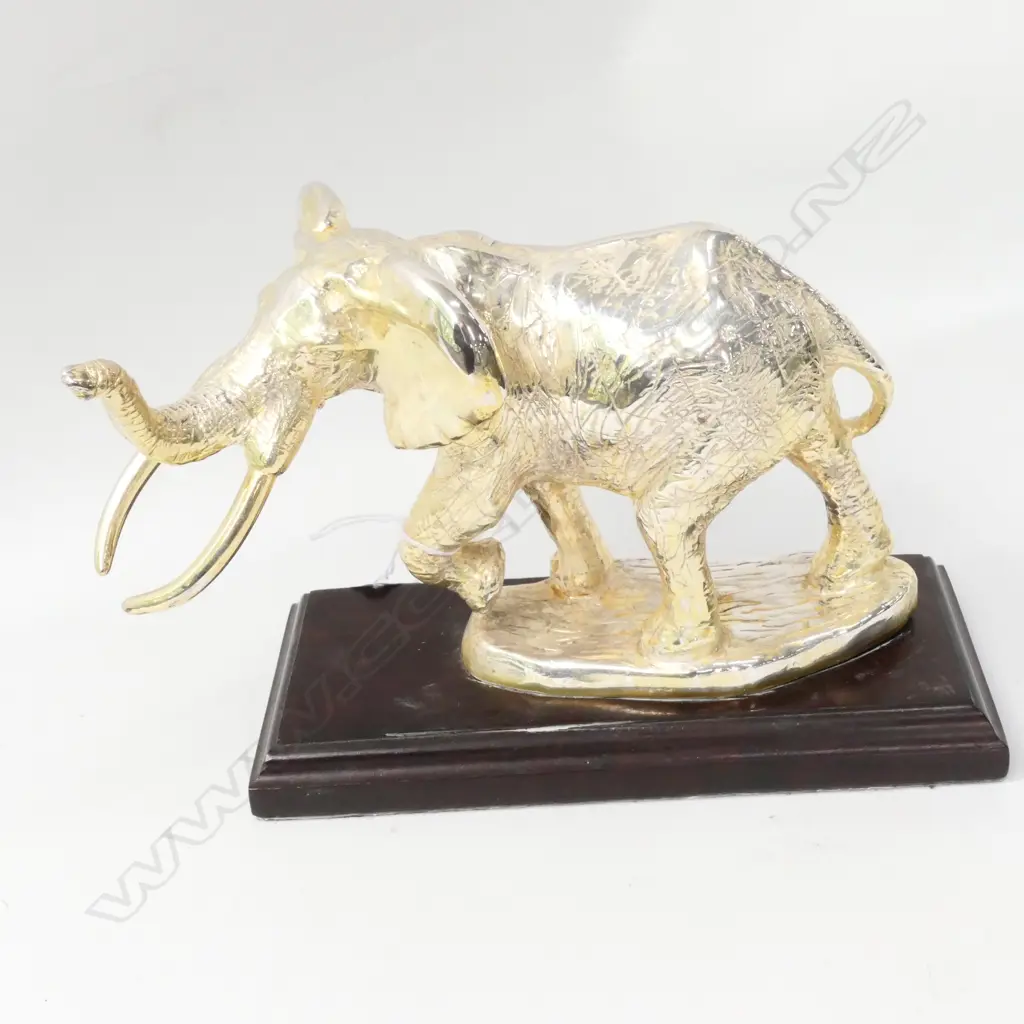 SILVER ELEPHANT ON WOODEN MOUNT - STAMPED D.G STERLING SILVER W. 200MM Image 1++