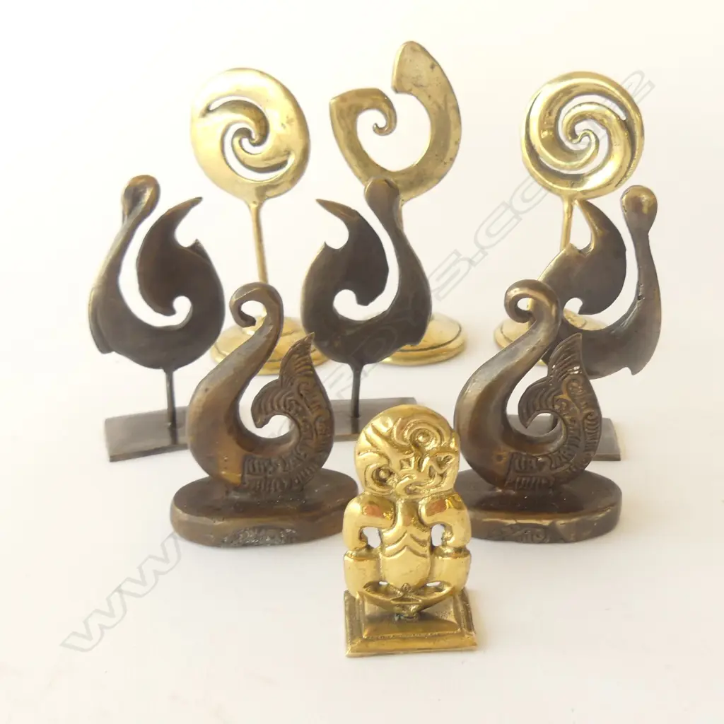 NINE BRASS TIKI & KORO ON STANDS, TALLEST: 120MM Image 1++