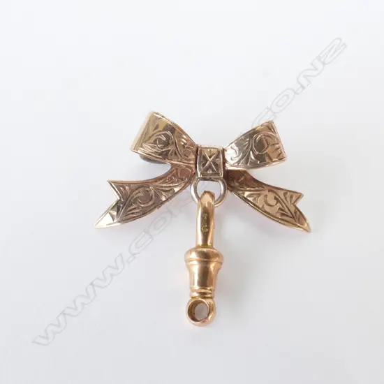 9CT ROSE GOLD BOW BROOCH AND DOG CLIP  3.96gm