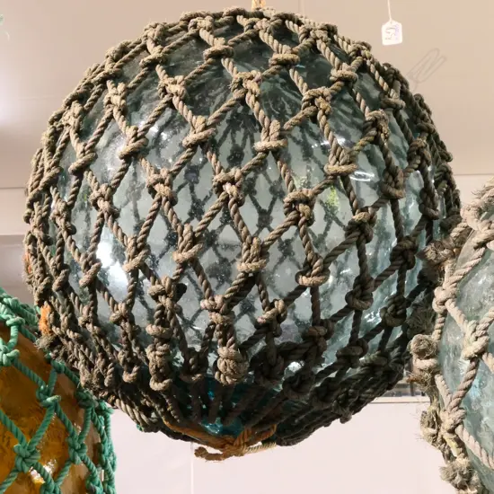 OLD LGE GLASS FISHING FLOAT WITH NETTING...