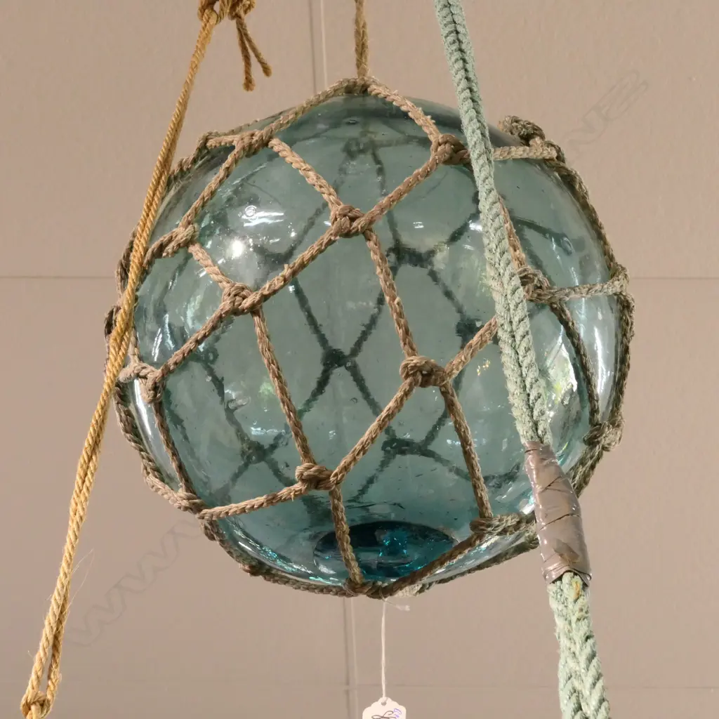 OLD GLASS FISHING FLOAT WITH NETTING... Image 1++