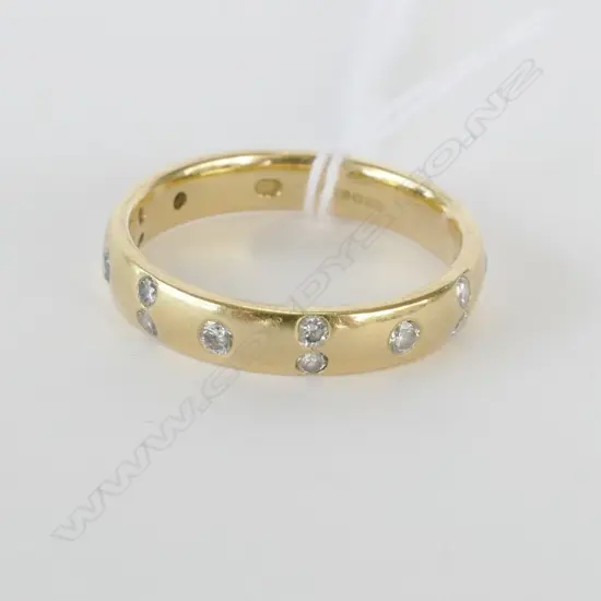 18CT GOLD  AND DIAMOND SET BAND (RETAIL REPLACEMENT $3759)